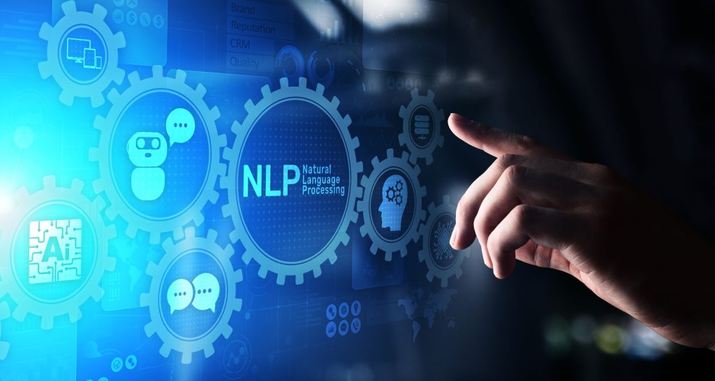 پردازش زبان طبیعی چیست؟ بازدید کامل مفاهیم و کاربردهای NLP_آفتاب شرق 11 دست یک شخص در حال لمس تصویر اسکریم که ر روی آن نوشته شده nlp